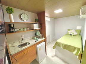 STUDIO aconchego, com Ar, Wifi, Smartv e Cozinha